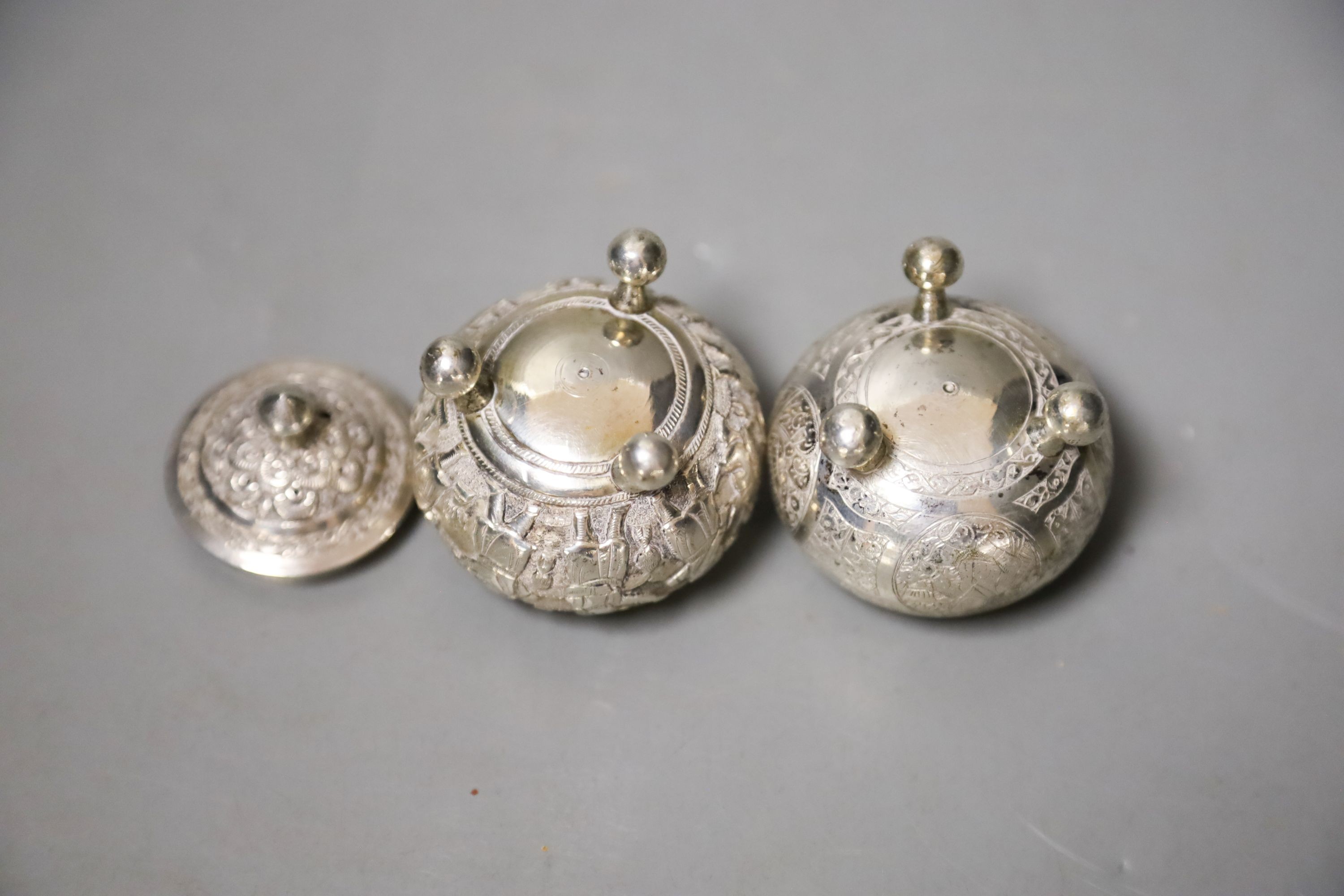 Two small Indian white metal condiments, tallest 57mm.